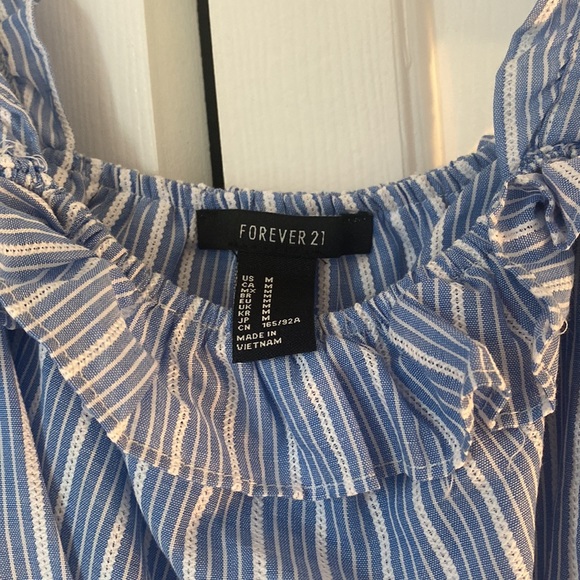 Woman’s Forever21 blue stripe crop top. Size medium. - Picture 2 of 3